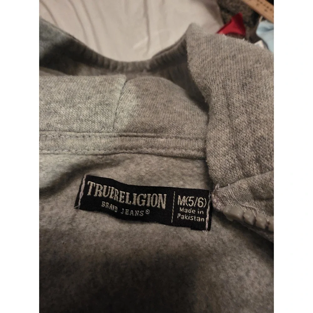 True Religion C H ilds Hoodie. Gray‎ With Full Iron On On Back. Symbol On Front.